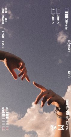 two hands reaching for each other in front of a blue sky with clouds and words