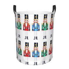 a bucket with nutcrackers on it and the handles are painted in different colors