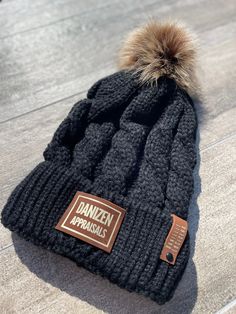 Welcome to MOHR Than A Shop! 🖤 BEST CLASSIC BEANIE POM HAT! Classic cable knitting makes this soft hat a must have addition to your winter wardrobe. ✔️One Size ✔️100% Acrylic with faux fur pom-pom ✔️Handwash cold, Dry flat ✔️Blow dry pom to re-fluff These beanies for men and women are available in 7 colors so I'm sure you'll find the perfect one. If not, please ask and I will be MOHR than happy to assist you!! You can make this hat one of a kind with the custom option available to you. Simply a Adjustable Hats For Cold Weather, Adjustable Comfortable Hats For Cold Weather, Cozy Cable Knit Beanie For Outdoor, Winter Outdoor Cable Knit Hats, Cable Knit Beanie For Fall, Cable Knit Beanie For Cold Weather, Cold Weather Cable Knit Hat, Fall Cable Knit Beanie, Fall Cable Knit Hat