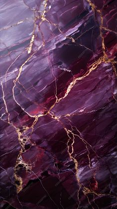 purple marble with gold veining on it