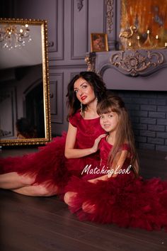 Mommy and Me Dress, Mother Daughter Matching Dress, Formal Photoshoot Dress Feel like a gueen and princess in this adorable trendy hi low burgundy dresses with tulle multilayered bottom with train and removable bow, open back and lace top part With this high low tulle dress with open back you will have many compliments. Dresses can be worn with heels, flats or even sneakers. Different colors and color combinations are possible. SIZES AND CUSTOMISATION Dresses are tailored to order in any standar Fitted Tutu Dress For Christmas Fancy Dress, Fitted Christmas Tutu Dress For Fancy Dress, Sleeveless Christmas Tutu Dress, Fitted Red Tutu Dress For Festive Occasions, Red Fitted Tutu Dress For Festive Occasions, Elegant Christmas Tutu Dress For Holiday, Elegant Christmas Holiday Tutu Dress, Fitted Tutu Dress For Holiday Festivities, Fitted Tutu Dress For Festive Holidays