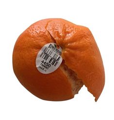 an orange that has been cut in half with a sticker attached to it's side