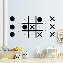 a kid's room with toys and wall decals on the walls in black