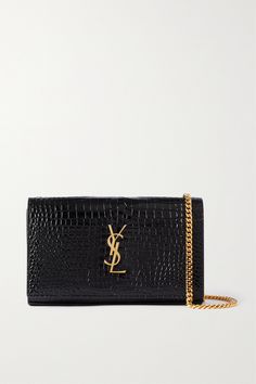 SAINT LAURENT's 'Cassandre' bag comes in a glossy croc-effect leather making it a sleek addition to any look. It's adorned with the iconic 'YSL' plaque and opens to reveal a zipped compartment and slots to store valuables and credit cards. The gold-tone chain is removable, so you can carry it as a clutch, too. Boot Pumps, Cute Purses, Saint Laurent Bag, Dark Brown Leather, Quilted Leather, Leather Pouch, Free Bag, Chain Strap, Ysl Bag