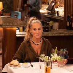 two women sitting at a table in a restaurant