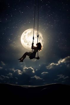 a woman sitting on a swing in front of the moon with her legs hanging down