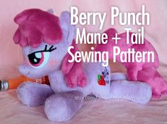 a pink stuffed pony with the words berry punch mane + tail sewing pattern on it