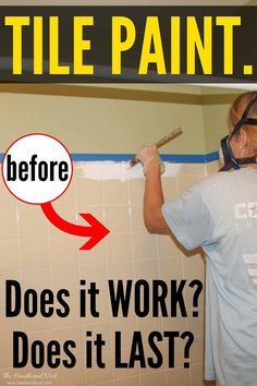 a woman is painting the wall in her bathroom with blue tape and an arrow pointing to it