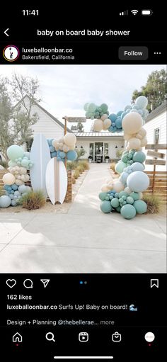 an image of a surfboard arch with balloons attached to it and the words balloon bar below