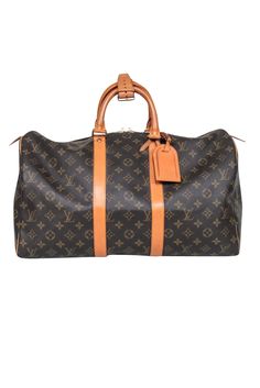 Travel in style with the Louis Vuitton Keepall 45. Featuring a classic brown monogram print and vachetta leather trim, handles, and luggage tag, this bag is the perfect blend of luxury and functionality. And it doesn't hurt to show off a little on your travels. Made in USA Coated canvas Vachetta Leather trims, handles, and luggage tag Double top zipper Attached lock without key Date code: SD0929 Minor watermarks Height 12" Width 18" Depth 8" Handle drop 4" Pre-owned Brown Monogram Canvas Bag, Luxury Travel Bag In Monogram Canvas, Luxury Pre-owned Brown Bag, Pre-owned Designer Brown Bags, Designer Bags With Luggage Sleeve For Trip, Pre-owned Monogram Canvas Business Bag, Elegant Monogram Canvas Travel Bag With Leather Trim, Designer Luggage For Trips, Brown Leather Trim Bags In Signature Coated Canvas