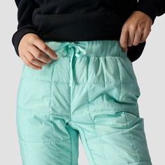 As temps plummet, we get winterized with our Stoic Puffer Jogger. Packed with an ultralight yet toasty fill, this pair keeps us cozy through the chill. The treated ripstop exterior makes sure flakes don't soak through. Sporty Winter Nylon Bottoms, Casual Midweight Winter Bottoms, Green Bottoms For Outdoor Winter Activities, Sporty Winter Bottoms For Outdoor, Sporty Winter Outdoor Bottoms, Midweight Bottoms For Winter Outdoor Activities, Winter Sports Nylon Bottoms, The Stoics, Joggers Womens