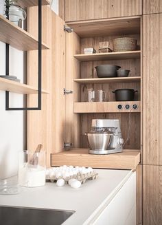 the kitchen is clean and ready to be used as a storage area for cooking utensils