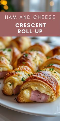 ham and cheese crescent roll - up on a white plate with pink text overlay