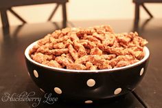 a bowl filled with food sitting on top of a table