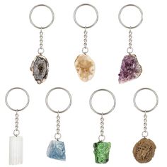 PRICES MAY VARY. A collection of seven keychains, each featuring a powerful crystal, embodies a profound connection to the natural world: Amethyst Cluster keychain, White agate geode keychain, Druzy Agate Geode keychain, Selenite keychain, Celestite keychain, Ruby zoisite keychain and Desert Rose keychain. Stainless steel double rings: Each keychain is meticulously designed with stainless steel double rings that not only elevate the aesthetic but also ensure long-lasting durability Connect with Cluster Keychain, Rose Keychain, Keychain Aesthetic, Vinyl Display, Double Rings, Crystal Keychain, Chakra Healing Crystals, Power Crystals, Ruby Zoisite