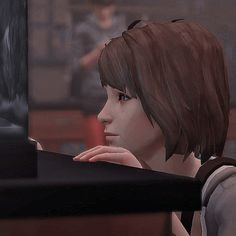 an animated image of a woman sitting at a table with her hand on her chin