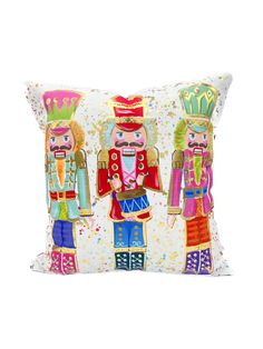 two nutcrackers on a white pillow