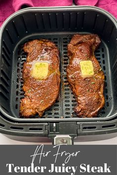 an air fryer with two steaks in it and the words, air fryer tender juicy steak