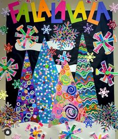 a bulletin board decorated with colorful paper decorations