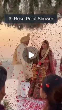 the bride and groom are surrounded by confetti