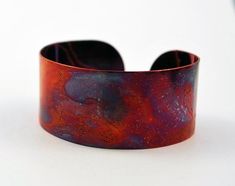 This etched copper bangle bearing imagery of stags running across an art nouveau style landscape, has been heat treated to create a vibrant multicoloured patina: this will deepen over time. I have developed a technique of literally 'painting' with a flame to manipulate the shape and direction of the colours. Although there is a degree of control, each piece is unique, as the colour patina cannot be replicated exactly.In holistic medicine, copper claims to have many health benefits: 'Copper has b Eye Infections, Stag Deer, Etched Copper, Deer Design, Holistic Medicine, Art Nouveau Style, Water Purifier