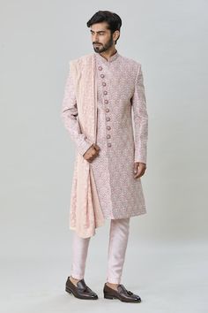 Pink sherwani featuring all-over floral butti embroidery and stand collar. Paired with a churidar and embroidered stole, with attached inner lining., Fit: Relaxed Designer Bandhgala With Chikankari Embroidery For Traditional Ceremonies, Designer Bandhgala With Chikankari For Traditional Ceremonies, Designer Sherwani With Resham Embroidery For Traditional Ceremonies, Designer Traditional Wear With Chikankari Embroidery For Ceremonies, Designer Resham Embroidery Kurta For Traditional Ceremonies, Designer Fitted Pink Sherwani, Designer Sherwani For Traditional Ceremonies, Designer Embroidered Sherwani For Traditional Ceremonies, Designer Bandhgala For Diwali And Traditional Ceremonies