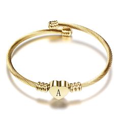 These fashionable stainless steel bangles never go out of style! They are the prefect gift or addition to your collection. Diameter: 2.5 in (6.3 cm)Weight: 0.5 oz (13 g) Alphabet Charms, Initial Charm Bracelet, Alphabet Charm, Bracelet Initial, Bracelet Couple, The Bangles, Letter Bracelet, Cuff Jewelry, Cuff Bangle Bracelet