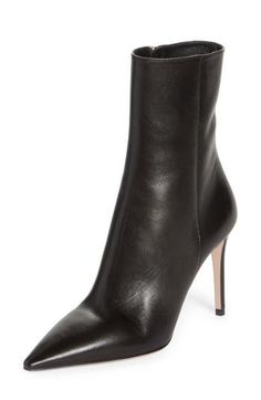 Instantly elevate any ensemble with this sleek and polished boot crafted in Italy from lambskin leather with a seamless front that leads to a pointy toe. The label's iconic triangle-logo hardware is inlaid at the top of the stiletto heel for a signature touch. 3 3/4" (95mm) heel (size 38.5) 6" shaft Side zip closure Leather upper, lining and sole Made in Italy Women's Designer Shoes Luxury Snip Toe Heeled Boots For Fall, Fitted Leather Mid-calf High-top Boots, Fitted Leather Mid-calf High Ankle Boots, Designer Fitted Snip Toe Boots, Designer Fitted Boots With Pointed Toe, Sleek Calf Leather High Heel Boots, Luxury Fitted Ankle-high Heeled Boots, Sleek High Heel Calf Leather Boots, Fitted Leather Mid-calf Boots For Evening