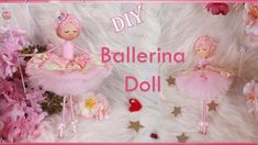 some pink dolls and flowers on a white fur background with the words diy ballerina doll