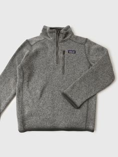 DESCRIPTION:Quarter-zip pullover made from sustainable knit fleece.FEATURES:Stand-Up CollarQuarter-Zip ClosureZip Chest PocketFleece Fabrication10-oz 100% Recycled Polyester KnitClassic Fit Half Zip Pullover Patagonia, Quarter Zip Patagonia, Grey Quarter Zip Sweater, Sherpa Quarter Zip, Patagonia Kids, Grey Quarter Zip, Better Sweater, Fleece Sweater, Saint Bernard