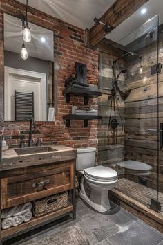 a bathroom with a toilet, sink and shower stall in it's own area