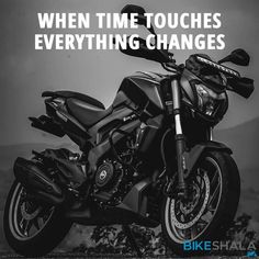 a black and white photo of a motorcycle with the words when time touches everything changes