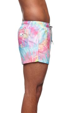 Splashed with color and made for fun, these lightweight swim trunks cut from quick-drying fabric keep you comfortable in and out of the water. Mesh liner 100% polyester Machine wash, tumble dry Imported Spiral Tie Dye, Tie Dye Shorts, Green Cream, Nordstrom Store, Ties Mens, Swim Trunks, Swim Shorts, Mens Shorts, Eyebrows