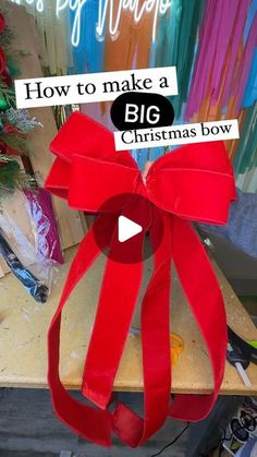 a red bow with the words how to make a big christmas bow written on it