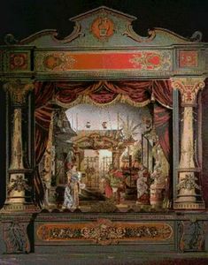 an elaborately decorated stage with red curtains