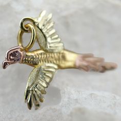 This is the perfect option for those who like cool, unique jewelry and luxury. It is perfect for a gift for birthdays, mother's day, and holidays. This pendant is well made, cute, and/or elegant in design, and very desirable. ❤️ This pendant has the shape of a bird. It is 7/8'' by 11/16'' wide. ❤️ The pendant is made from yellow and rose solid gold. ❤️ There is a hallmark. of 10K. ❤️The weight is 1g. Everyone interested in the jewelry should remember that he or she must like their jewelry- not j Rose Gold Charms Jewelry Gift, Rose Gold Charms Jewelry For Gift, Rose Gold Jewelry With Charms For Gift, Rose Gold Charm Necklaces As Gift, Rose Gold Charm Necklaces For Gift, Symbolic Rose Gold Jewelry Gift, Nickel Free Rose Gold Charms For Gifts, Rose Gold Pendant Charms As Gift, Rose Gold Pendant Charms For Gifts