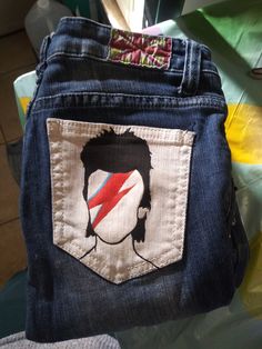 Hand painted/ free hand painted Bowie jeans! 🎵Super cool and trendy. Machine wash brand; US size 00-0. One of a kind! Jean Diy, Custom Jean, Diy Jeans, Custom Jeans, Painted Jeans, Jeans Diy, Music Design, Womens Jeans, Pittsburgh Pa