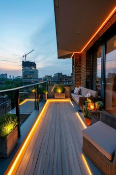 an outdoor deck with lights and plants on it