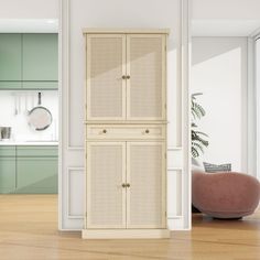 a white cabinet sitting in the middle of a living room