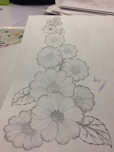 a pencil drawing of flowers on paper