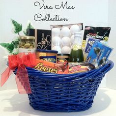 a blue basket filled with food and drinks