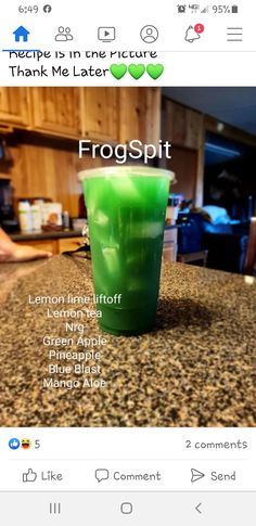 a green cup sitting on top of a counter