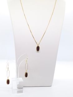 This is a beautiful dark brown necklace and earrings set. The necklace is made of gold and the earrings are made of silver. Oval Pendant Jewelry Set As Gift, Brown Necklace, The Necklace, Necklace And Earrings Set, Necklace And Earrings, Tennis Bracelet, Christmas Sale, Earrings Set, Brown Gold