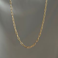 "This dainty piece is the perfect everyday staple. No matter the occasion, be sure to feel gorgeous in such a high quality necklace, made for you.   MATERIALS & COMPONENTS * Made with 304 Gold Plated Stainless Steel Paperclip chain - 5x2.5x0.5mm * Water & Tarnish resistant * Skin friendly * Your choice of 16\", 18\", 20\" & 22\"   JEWELLERY CARE  Although Stainless Steel jewellery is water and tarnish resistant, I'm sure you want your jewellery to last as long as possible  * Avoid swimming in the sea & swimming pools  * Avoid wearing your jewellery when showering and exercising * Put on perfumes and lotions before putting on your jewellery  * If your pieces get wet, pat it dry immediately. SHIPPING & RETURNS  We offer FREE delivery on UK orders via 2nd Class Royal Mail.  We offer a 14 day Minimalist Paperclip Chain Necklace As Gift, Simple Paperclip Chain Necklace As Gift, Minimalist Paperclip Chain Necklace For Gift, Simple Paperclip Chain Necklace Gift, Minimalist Paperclip Chain Necklace Gift, Gift Clavicle Chain Necklace With Paperclip Shape, Dainty Paperclip Chain Necklace For Gift, Gift Paperclip Clavicle Chain Necklace, Classic Paperclip Chain Necklace As Gift