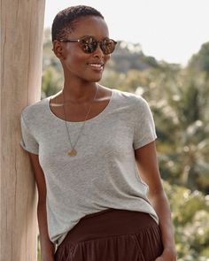 This tee shirt is a show of seasonless simplicity in a soft blend of organic pima cotton and TENCEL jersey with a touch of shape-retaining spandex. Slightly relaxed fit. Scoop neckline. Short sleeves. Low-hip length. Organic pima cotton/TENCEL lyocell/spandex. By Garnet Hill. Casual Modal T-shirt, Casual Modal Tops For Everyday, Casual Modal Scoop Neck Top, Relaxed Everyday Scoop Neck Tops, Relaxed Scoop Neck Top For Everyday, Everyday Relaxed Scoop Neck Top, Effortless Scoop Neck Everyday Tops, Effortless Everyday Scoop Neck Tops, Relaxed Fit Pima Cotton Tops For Summer