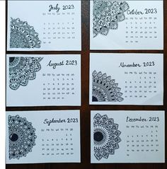 four calendars with black and white designs on them