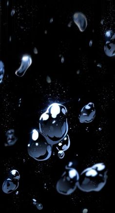 drops of water on a black surface