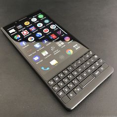 the back side of a blackberry phone on a table