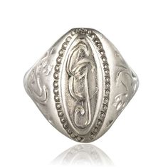 Ring in silver. The top of this signet ring is shuttle-shaped, the center is decorated with the initials GC surrounded by a beaded. On both sides, the start of the ring is chiseled with a plant motif. The carving is slightly weathered. Height: 21 mm, width: 11.7 mm, thickness: 2.1 mm, width of the ring at the base: 3.2 mm. Total weight of the jewel: 4.9 g approximately. US Size : 9,75 ; Free resize, please contact us. Authentic antique jewel - French work of the 19th century. Our opinion: A silv Silver Signet Ring, The Jewel, Luxury Vintage, Antique Rings, Black Enamel, Signet Ring, Vintage Rings, Beautiful Rings, Antique Jewelry