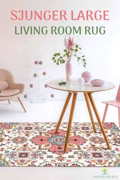 a living room rug with pink chairs and a round table in front of a white wall